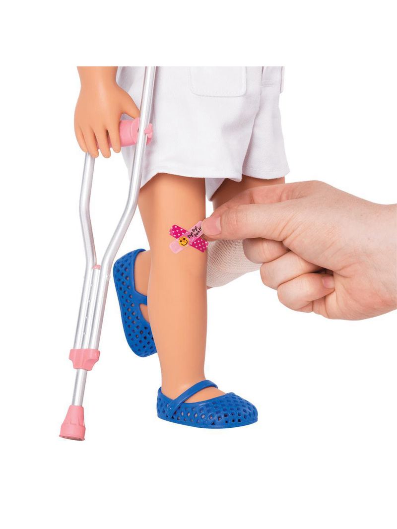 Conjunto de roupa com muletas - our generation