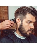 Cortador de cabelo profissional com lâmina titanium e acessórios 220v multi - eb037