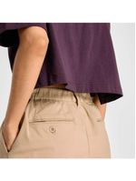 Calça new balance twill boylston feminina