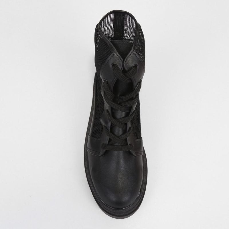 Bota coturno moleca cano médio feminina