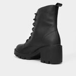 Bota coturno cano medio look fashion salto médio tratorado feminina